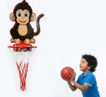 Child playing with wall mounted Monkey Face Basketball Hoop for Kids