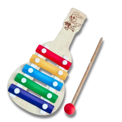 Angled close-up of colorful keys on toddler wooden guitar xylophone musical toy